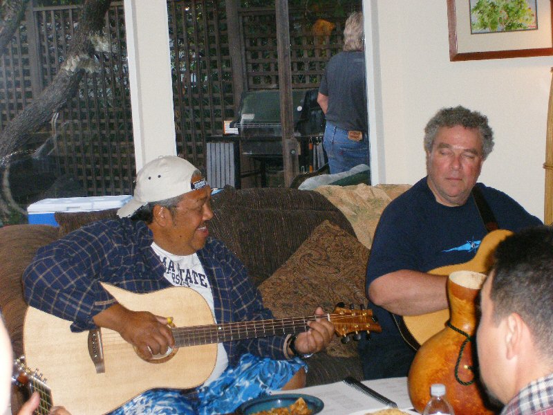 Kevin Brown on the couch in our living room, my funny face to his right